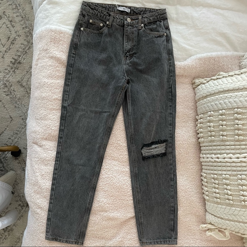 Adika dark washed jeans with rip in knee